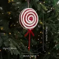 Red and white lollipop Christmas tree ornament with glitter and bow on festive tree - Large Candy Style B