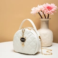 Chic white circular quilted crossbody bag with gold chain and cute cat charm decoration - White