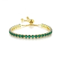 Adjustable gold tennis bracelet with square-cut emerald green zircons on white base - Light Gold + Emerald Zirconia