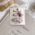 Detail of pink floral fabric snap clip and bow hairpin with pearls on display card - Pearl Bowknot