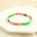 Macro shot of colorful pastel cube beads and gold spacers on a woven stretch bracelet - Pink Purple Multicolor-E