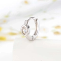 Silver huggie earring featuring a bezel-set oval zircon and minimalist smooth finish - White (Single Piece)