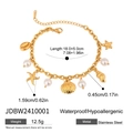 Detail view of 18K gold stainless steel bracelet with starfish and pearl charms - Ocean Element Charm Bracelet