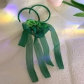 Close-up of deep green silk ribbon bow earrings with long tassels on white satin - Green Bowknot Tassel (83# Silver Earring Post) / Dark Green
