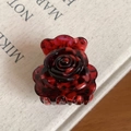 Red and black marbled acetate rose flower hair claw clip shown on a cream prop book - Wine Red 4.5cm