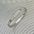 Bracciale a cuore in acciaio al titanio argento con doppia fila di zirconi bianchi pavé - Fila di Diamanti Cuore / Cuore d'Argento