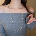 Long baroque pearl necklace with gold chain layered over a grey sweater for a French chic style - Mixed Arrangement Long Style (44#) / Gold-White Pearl