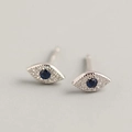Elegant S925 silver evil eye stud earrings with blue sapphire and white zircon accents - Stud Earrings / White Gold