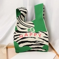 Green and white zebra print knit tote bag with red BE HAPPY text decoration - Be Happy Green