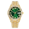 Detailed macro view of iced-out men's watch with green sunburst dial and roman numerals - Gold Green