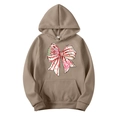 Brown Christmas hoodie with festive bow print and kangaroo pocket for holiday season - Camel