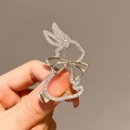 Élégante broche lapin en or avec strass scintillants et un petit nœud délicat - Style Lapin (0121)