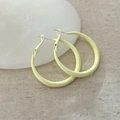 Macro shot of pale yellow acrylic hoop earrings on a beige linen and stone surface - 19# Silver Pin - Milk Yellow - Large 5cm Hoop
