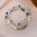 Elegant beaded crystal bracelet with white gourd pendant on champagne silk background - White Crystal Strawberry Quartz Zircon Gourd Double Layer Bracelet