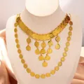 Detailopname van de Midden-Oosterse bruidsketting met gouden munten en boho-kwastjes - Dubbellaagse ketting