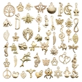 Golden alloy DIY charms collection featuring assorted animal and nature pendant shapes - New KC Gold 50 Styles Set