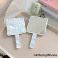 Floral pattern handheld makeup mirror with blue floral design and square rounded handle - 04 Flowers Blooming