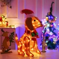 Detail of dachshund Christmas figure with warm LED lights and colorful scarf - Pine Needle Dog 50L Warm White