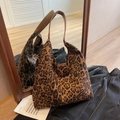 Classic leopard print tote bag with brown handles and a spacious bucket design - Leopard Brown