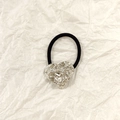 Silver hollow heart hair tie with metallic crinkle texture on a beige paper background - Silver Heart Lava Texture 3.5cm