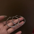 Elegant silver geometric hoop earrings with full pave white zircon stones held by hand - Small Silver Silver Earring Post (Full Rhinestone Hoop)