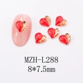 Macro view of 8x7.5mm red marble heart nail charms with gold metallic edges - L288-Red and Gold Spliced Heart