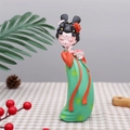 Traditional Tang style doll figurine in red and green hanfu holding a lotus flower - J022 Holding Flower