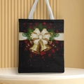 Detail of black canvas Christmas tote bag with gold bells, ribbons and festive print - Style 20