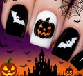 Macro view of Halloween press-on nails featuring Jack-o'-lantern and bat patterns - Halloween Bat & Pumpkin Style (CW726) / 24 Pcs + Jelly Glue + File