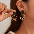 Detail of leopard print geometric round earrings shown on a model for style and size - Leopard Flocked Semi-Circle Stud Earrings (Stainless Steel Earring Post)