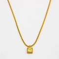 Collana a catena intrecciata dorata con un ciondolo quadrato con gemma gialla minimalista - Oro Champagne