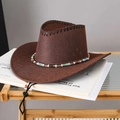 Detail of a brown woven cowboy hat featuring colorful beaded trim and metal side eyelets - Coffee