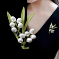 Elegant lily of the valley brooch featuring white pearls and green enamel leaves - Lily of the Valley Pearl