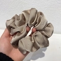 Elegant champagne gold satin scrunchie with rhinestones for a stylish hair accessory - Champagne