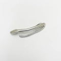 Detailed macro view of a silver irregular punk style hair clip on white background - Fork Shaped Silver