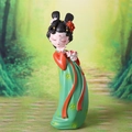 Traditional Chinese girl resin figurine in red and green hanfu holding a pink lotus - Holding Flower Style (J022)