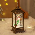 Vintage bronze Christmas snow globe lantern with snowman and swirling glitter effects - Snowman