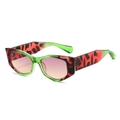 Occhiali da sole cat-eye alla moda con montatura verde e lenti sfumate viola - Montatura Leopardo Verde Rosa Lenti Viola Giallo
