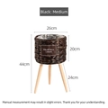 Mid-sized black woven wicker flower pot with tripod wooden legs and waterproof liner - Medium / Dark Coffee