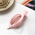 Pink matte oval hair claw clip for elegant hairstyles, displayed on a white surface - Matte Pink