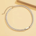 Silver chunky curb chain necklace with a polished rectangle pendant on a beige surface - Silver