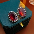 Macro view of vintage rhombus crystal fringe earrings in red on a green jewelry box - 19# Silver Needle-Gun Black-Red
