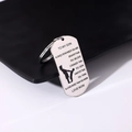Detailed view of stainless steel military dog tag keychain with laser engraved message - Style 7 (Mother & Son Silhouette)