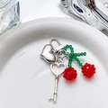 Handmade cherry bead and heart lock keychain charm for bags in minimalist design - Cherry Heart Lock Pendant / Red