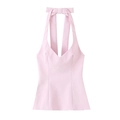 Haut licou sexy rose pour femme avec un détail de nœud papillon au dos sur fond blanc - XS / Rose Clair