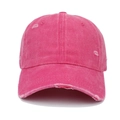 Close-up of distressed ripped details and worn edges on washed cotton baseball cap - Adjustable / Rose Red