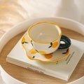Handcrafted ceramic coffee cup and saucer set featuring fresh lemon hand-painted patterns - 180ML / White Orange