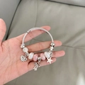 Silver beaded bracelet with pink glass beads and heart charm on stainless steel cord - Pink Bow Bracelet