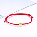 Minimalist red cord lucky bracelet with a small polished golden heart pendant - Red/Gold