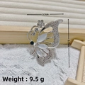 Silver butterfly brooch with white moonstone resin wings and sparkling rhinestones - Silver Butterfly Cat Eye